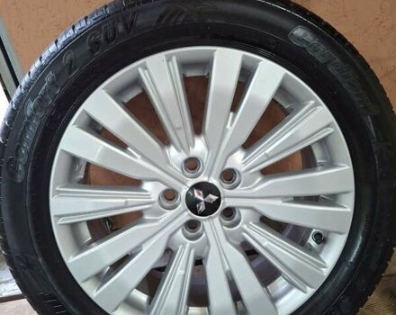 Красный Мицубиси Аутлендер, объемом двигателя 2.36 л и пробегом 110 тыс. км за 19000 $, фото 23 на Automoto.ua