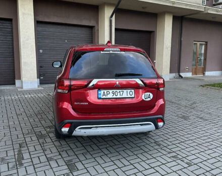 Червоний Міцубісі Аутлендер, об'ємом двигуна 2.36 л та пробігом 95 тис. км за 12500 $, фото 5 на Automoto.ua