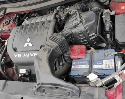 Червоний Міцубісі Аутлендер, об'ємом двигуна 3 л та пробігом 127 тис. км за 28500 $, фото 21 на Automoto.ua