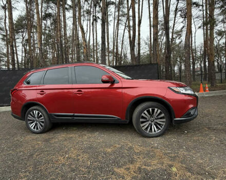 Красный Мицубиси Аутлендер, объемом двигателя 2.4 л и пробегом 197 тыс. км за 18700 $, фото 6 на Automoto.ua