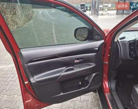 Красный Мицубиси Аутлендер, объемом двигателя 2.36 л и пробегом 110 тыс. км за 19000 $, фото 8 на Automoto.ua