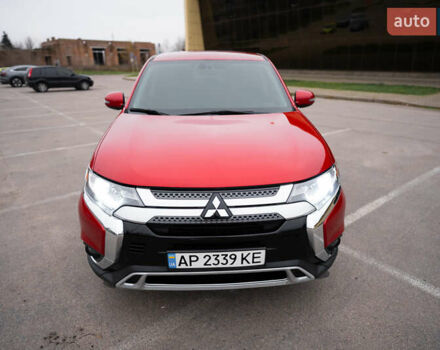Красный Мицубиси Аутлендер, объемом двигателя 2.36 л и пробегом 145 тыс. км за 17000 $, фото 13 на Automoto.ua