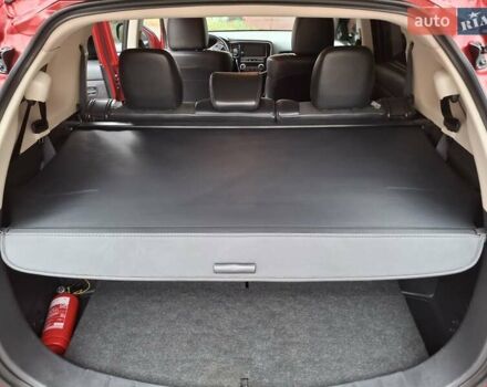 Красный Мицубиси Аутлендер, объемом двигателя 2.36 л и пробегом 110 тыс. км за 19000 $, фото 29 на Automoto.ua