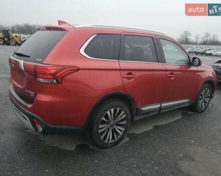 Красный Мицубиси Аутлендер, объемом двигателя 3 л и пробегом 100 тыс. км за 3000 $, фото 2 на Automoto.ua