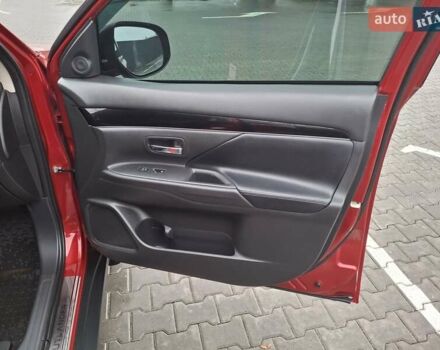 Красный Мицубиси Аутлендер, объемом двигателя 2.36 л и пробегом 110 тыс. км за 19000 $, фото 11 на Automoto.ua