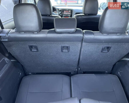 Красный Мицубиси Аутлендер, объемом двигателя 2.36 л и пробегом 100 тыс. км за 16500 $, фото 29 на Automoto.ua