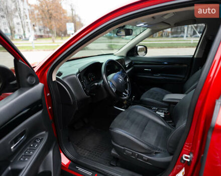 Красный Мицубиси Аутлендер, объемом двигателя 2.36 л и пробегом 145 тыс. км за 17000 $, фото 9 на Automoto.ua