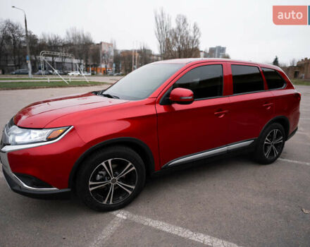 Красный Мицубиси Аутлендер, объемом двигателя 2.36 л и пробегом 145 тыс. км за 17000 $, фото 14 на Automoto.ua