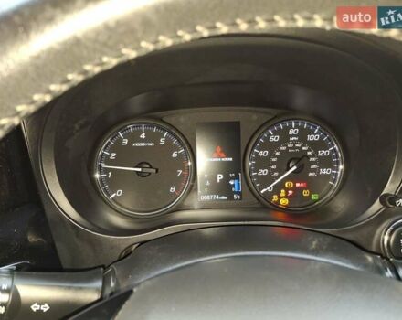 Красный Мицубиси Аутлендер, объемом двигателя 2.36 л и пробегом 110 тыс. км за 19000 $, фото 33 на Automoto.ua