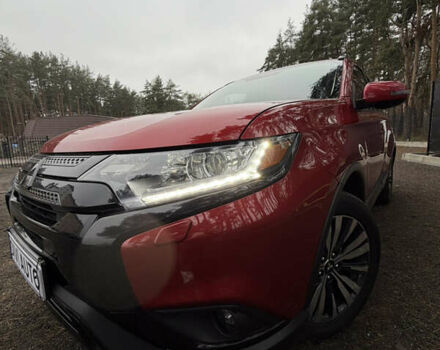 Красный Мицубиси Аутлендер, объемом двигателя 2.4 л и пробегом 197 тыс. км за 18700 $, фото 2 на Automoto.ua