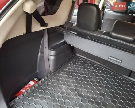 Красный Мицубиси Аутлендер, объемом двигателя 2.36 л и пробегом 110 тыс. км за 19000 $, фото 27 на Automoto.ua