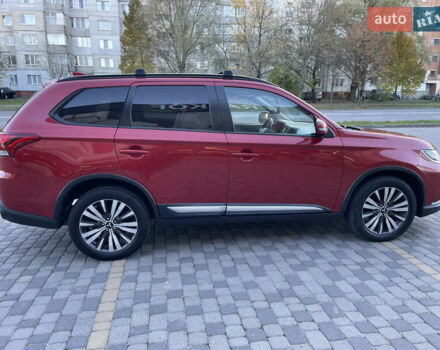 Красный Мицубиси Аутлендер, объемом двигателя 2.36 л и пробегом 100 тыс. км за 16500 $, фото 7 на Automoto.ua