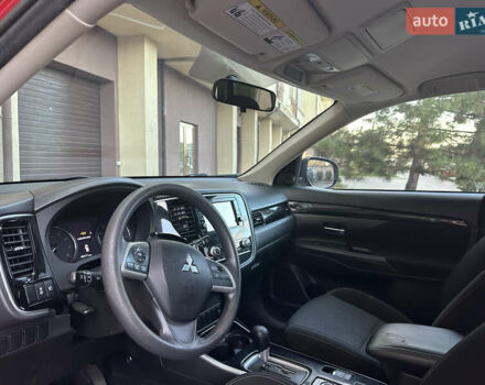 Червоний Міцубісі Аутлендер, об'ємом двигуна 2.36 л та пробігом 95 тис. км за 12500 $, фото 3 на Automoto.ua