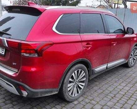 Червоний Міцубісі Аутлендер, об'ємом двигуна 3 л та пробігом 127 тис. км за 28500 $, фото 2 на Automoto.ua