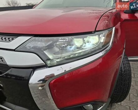 Красный Мицубиси Аутлендер, объемом двигателя 2.36 л и пробегом 110 тыс. км за 19000 $, фото 19 на Automoto.ua