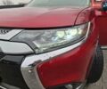 Красный Мицубиси Аутлендер, объемом двигателя 2.36 л и пробегом 110 тыс. км за 19000 $, фото 19 на Automoto.ua