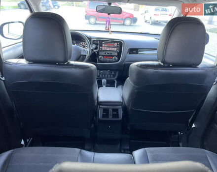 Красный Мицубиси Аутлендер, объемом двигателя 2.36 л и пробегом 100 тыс. км за 16500 $, фото 30 на Automoto.ua