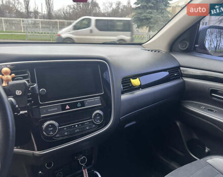 Червоний Міцубісі Аутлендер, об'ємом двигуна 2.36 л та пробігом 148 тис. км за 16500 $, фото 6 на Automoto.ua