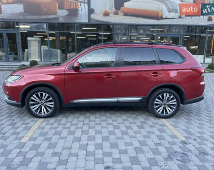 Красный Мицубиси Аутлендер, объемом двигателя 2.36 л и пробегом 100 тыс. км за 16500 $, фото 3 на Automoto.ua