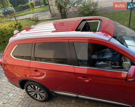 Красный Мицубиси Аутлендер, объемом двигателя 3 л и пробегом 106 тыс. км за 20700 $, фото 9 на Automoto.ua