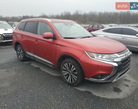 Красный Мицубиси Аутлендер, объемом двигателя 3 л и пробегом 100 тыс. км за 3000 $, фото 3 на Automoto.ua