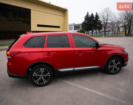 Красный Мицубиси Аутлендер, объемом двигателя 2.36 л и пробегом 145 тыс. км за 17000 $, фото 19 на Automoto.ua