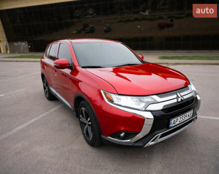 Красный Мицубиси Аутлендер, объемом двигателя 2.36 л и пробегом 145 тыс. км за 17000 $, фото 12 на Automoto.ua