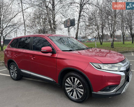 Червоний Міцубісі Аутлендер, об'ємом двигуна 2.36 л та пробігом 148 тис. км за 16500 $, фото 1 на Automoto.ua