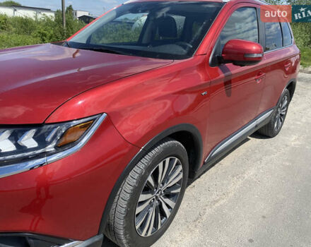 Красный Мицубиси Аутлендер, объемом двигателя 3 л и пробегом 106 тыс. км за 20700 $, фото 5 на Automoto.ua