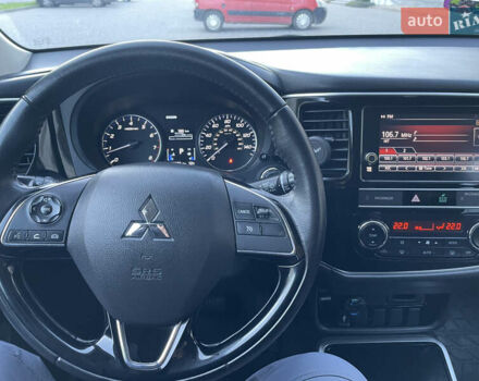 Красный Мицубиси Аутлендер, объемом двигателя 2.36 л и пробегом 100 тыс. км за 16500 $, фото 25 на Automoto.ua