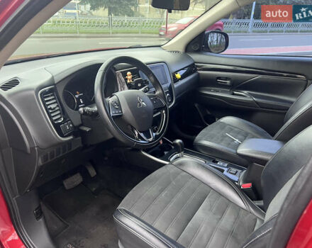 Червоний Міцубісі Аутлендер, об'ємом двигуна 2.36 л та пробігом 148 тис. км за 16500 $, фото 5 на Automoto.ua