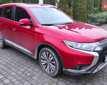 Червоний Міцубісі Аутлендер, об'ємом двигуна 3 л та пробігом 127 тис. км за 28500 $, фото 1 на Automoto.ua