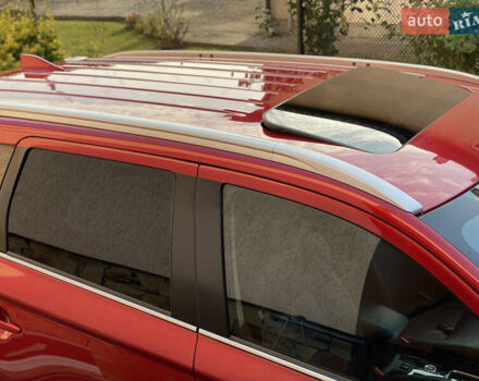 Красный Мицубиси Аутлендер, объемом двигателя 3 л и пробегом 106 тыс. км за 20700 $, фото 19 на Automoto.ua