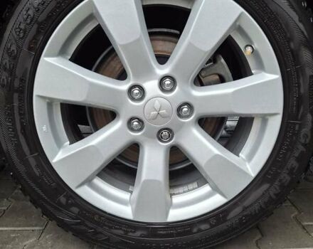 Красный Мицубиси Аутлендер, объемом двигателя 2.36 л и пробегом 110 тыс. км за 19000 $, фото 20 на Automoto.ua