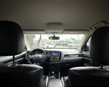 Красный Мицубиси Аутлендер, объемом двигателя 2.4 л и пробегом 197 тыс. км за 18700 $, фото 7 на Automoto.ua