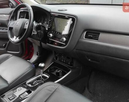 Червоний Міцубісі Аутлендер, об'ємом двигуна 3 л та пробігом 127 тис. км за 28500 $, фото 11 на Automoto.ua