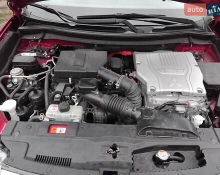 Красный Мицубиси Аутлендер, объемом двигателя 2 л и пробегом 53 тыс. км за 22800 $, фото 12 на Automoto.ua