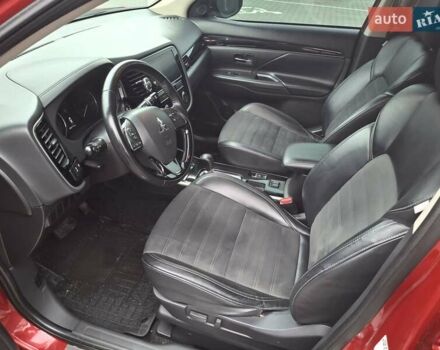 Красный Мицубиси Аутлендер, объемом двигателя 2.36 л и пробегом 110 тыс. км за 19000 $, фото 9 на Automoto.ua