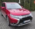 Червоний Міцубісі Аутлендер, об'ємом двигуна 3 л та пробігом 127 тис. км за 28500 $, фото 1 на Automoto.ua
