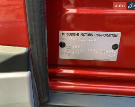 Красный Мицубиси Аутлендер, объемом двигателя 3 л и пробегом 106 тыс. км за 20700 $, фото 59 на Automoto.ua