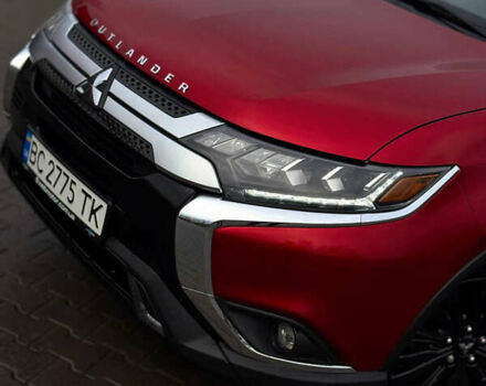 Червоний Міцубісі Аутлендер, об'ємом двигуна 3 л та пробігом 69 тис. км за 19000 $, фото 1 на Automoto.ua