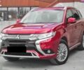 Красный Мицубиси Аутлендер, объемом двигателя 2.4 л и пробегом 55 тыс. км за 15950 $, фото 1 на Automoto.ua