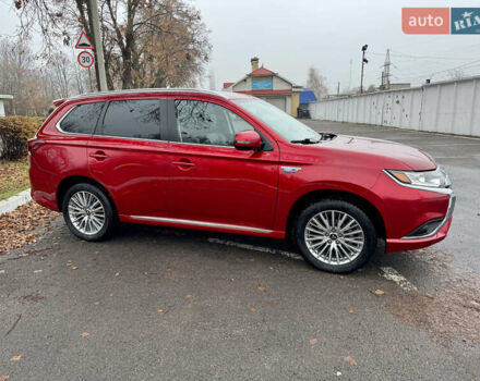 Красный Мицубиси Аутлендер, объемом двигателя 2.36 л и пробегом 65 тыс. км за 23800 $, фото 3 на Automoto.ua