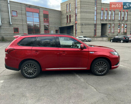 Красный Мицубиси Аутлендер, объемом двигателя 2.36 л и пробегом 94 тыс. км за 26000 $, фото 6 на Automoto.ua