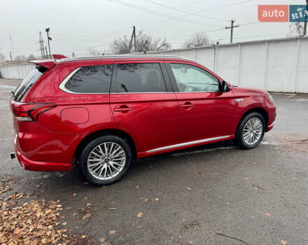 Красный Мицубиси Аутлендер, объемом двигателя 2.36 л и пробегом 65 тыс. км за 23800 $, фото 4 на Automoto.ua