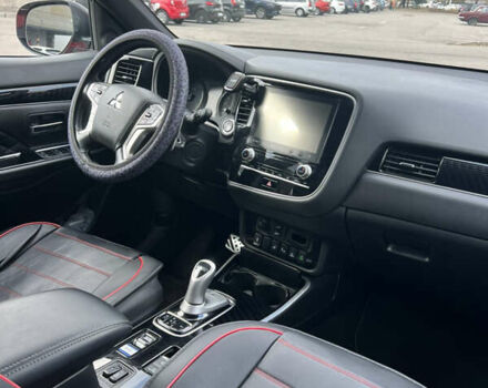 Красный Мицубиси Аутлендер, объемом двигателя 2.36 л и пробегом 94 тыс. км за 26000 $, фото 8 на Automoto.ua