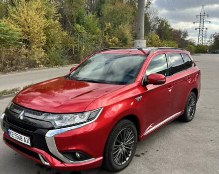 Красный Мицубиси Аутлендер, объемом двигателя 2.36 л и пробегом 94 тыс. км за 26000 $, фото 7 на Automoto.ua