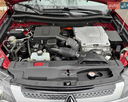 Красный Мицубиси Аутлендер, объемом двигателя 2.36 л и пробегом 65 тыс. км за 23800 $, фото 25 на Automoto.ua