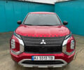Красный Мицубиси Аутлендер, объемом двигателя 2.49 л и пробегом 44 тыс. км за 25000 $, фото 1 на Automoto.ua