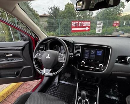 Красный Мицубиси Аутлендер, объемом двигателя 2 л и пробегом 38 тыс. км за 23000 $, фото 14 на Automoto.ua